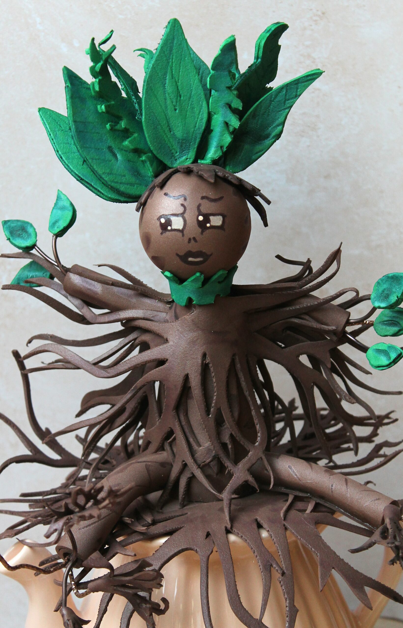 mandragore assise sur sa théière magique